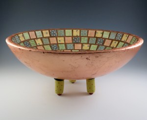 To complete the underside of the bowl, I used acrylic paint, copper leaf, and made polymer clay feet.